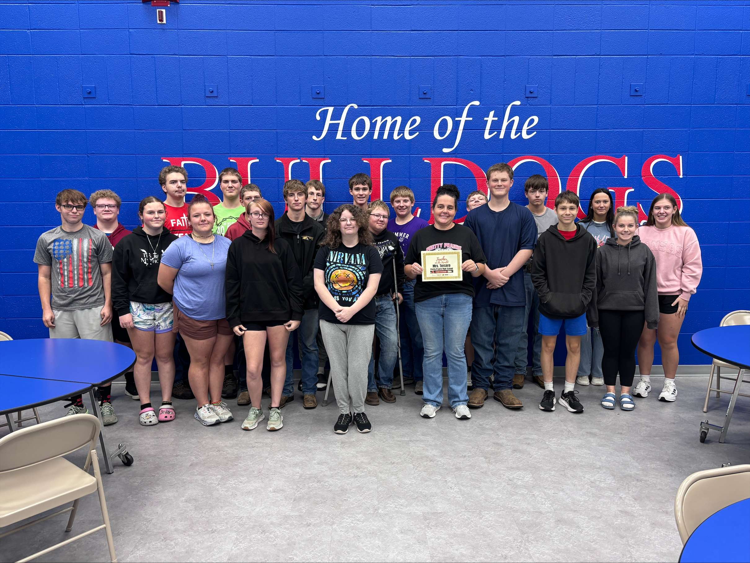 Pretty Prairie teacher Jessica Tercero, center, poses with the school’s 10th-grade class after receiving the September Teacher of the Month award, presented by Eagle Media and PrairieStar Health Center. (Hutch Post photo)