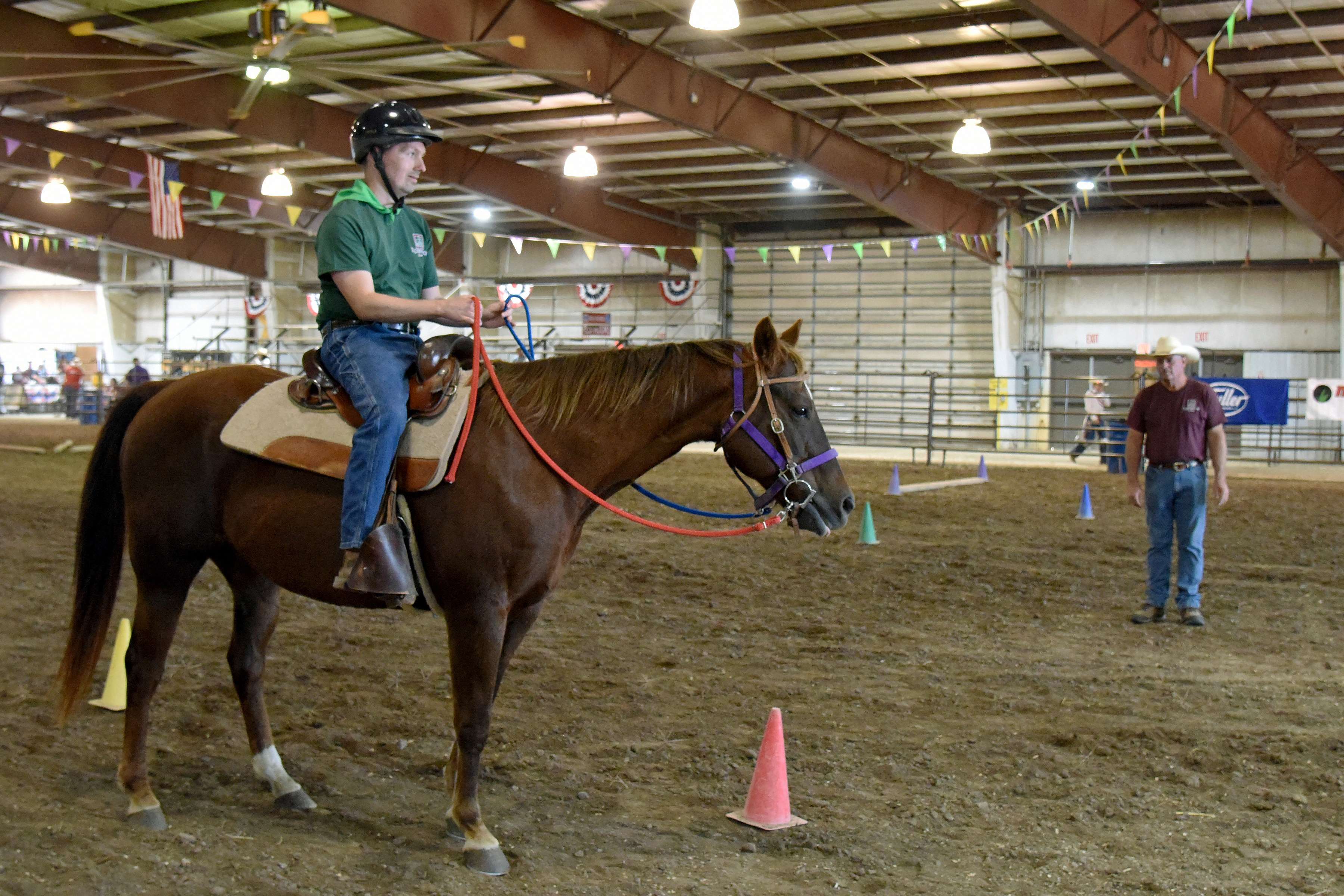Poise In The Saddle – Shaun Ledesma guides his horse, “Jordan,” through the trail pattern event at last October’s Rosewood Rodeo, held at the Barton County Fair Grounds Expo III Arena. Watching his ride was Rosewood Equine Therapy Instructor and Ranch Manager Eric Hammond. The 2025 event marked Ledesma’s 18th Rodeo. An accomplished rider, he earned a national championship at the NSBA World Show in Tulsa, Okla., in 2014.