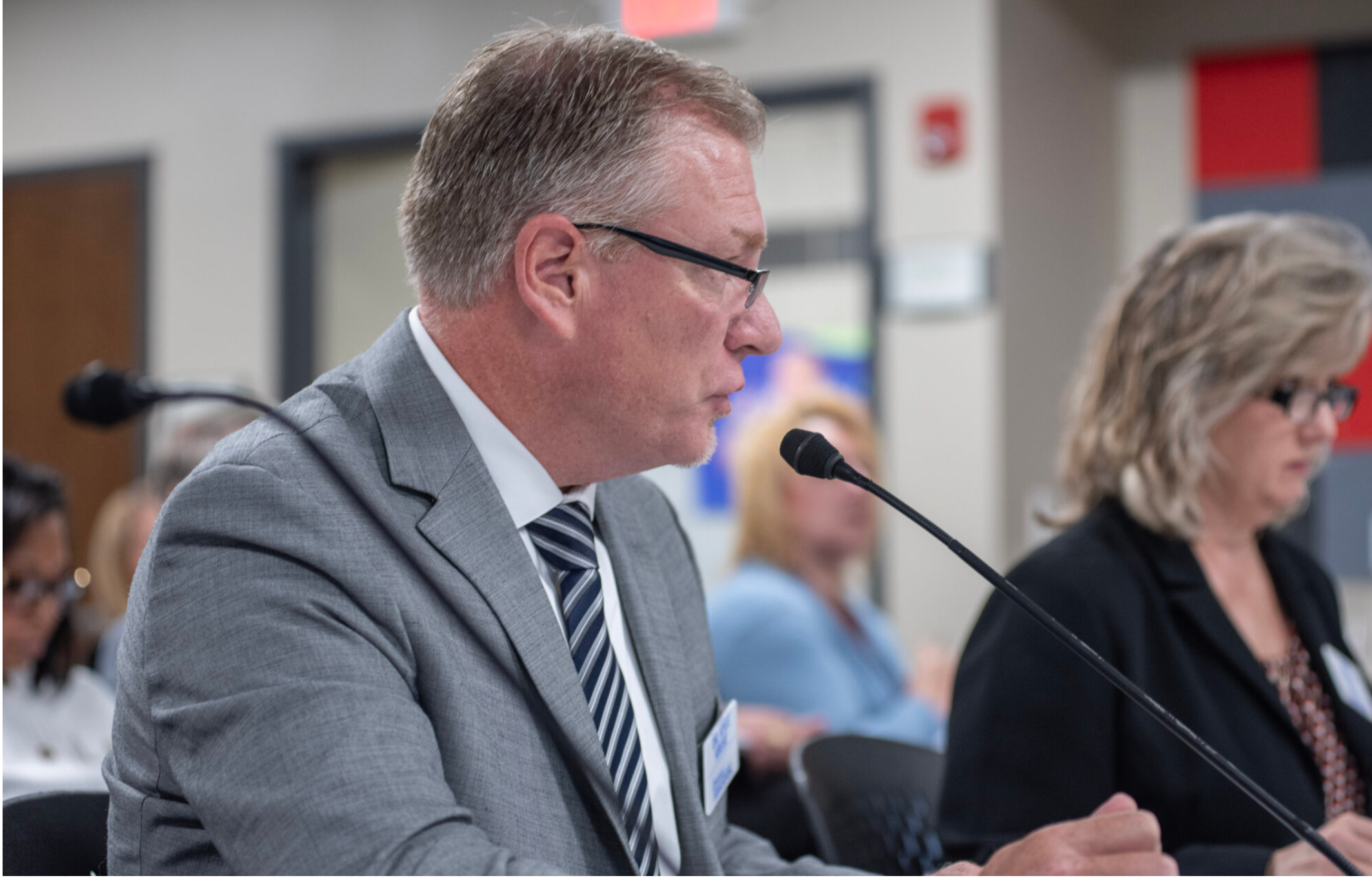  The Department of Elementary and Secondary Education's deputy commissioner of financial and administrative services Kyle Kruse, pictured presenting budget recommendations in September of 2025, brought the latest budget request to the State Board of Education for approval Tuesday (Annelise Hanshaw/Missouri Independent).