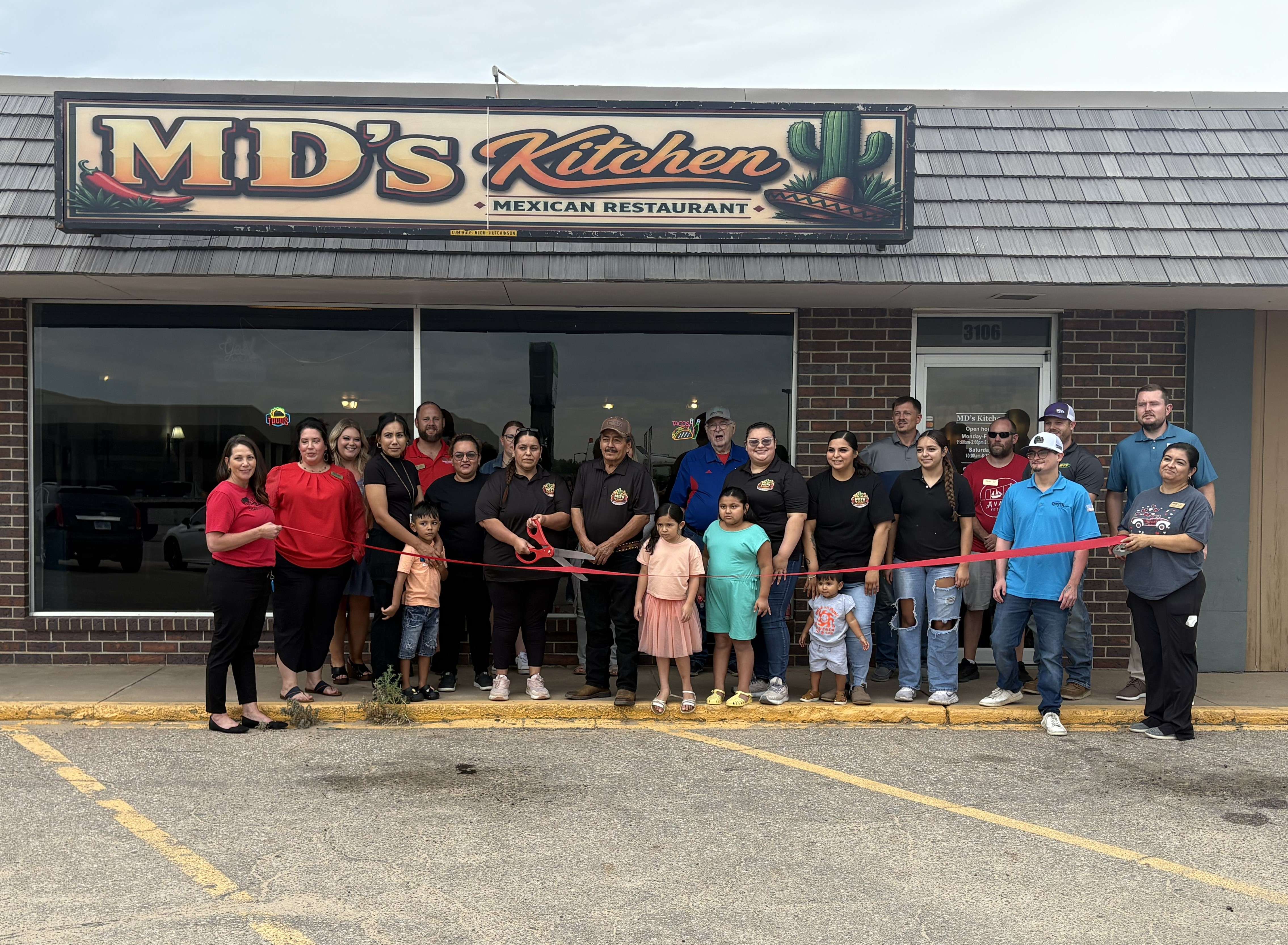 The MD’s Kitchen team, family members, Chamber Ambassadors and community supporters celebrate the locally owned Mexican restaurant at 3106 10th St. in Great Bend with a Chamber ribbon cutting. (photo courtesy of the Great Bend Chamber of Commerce)