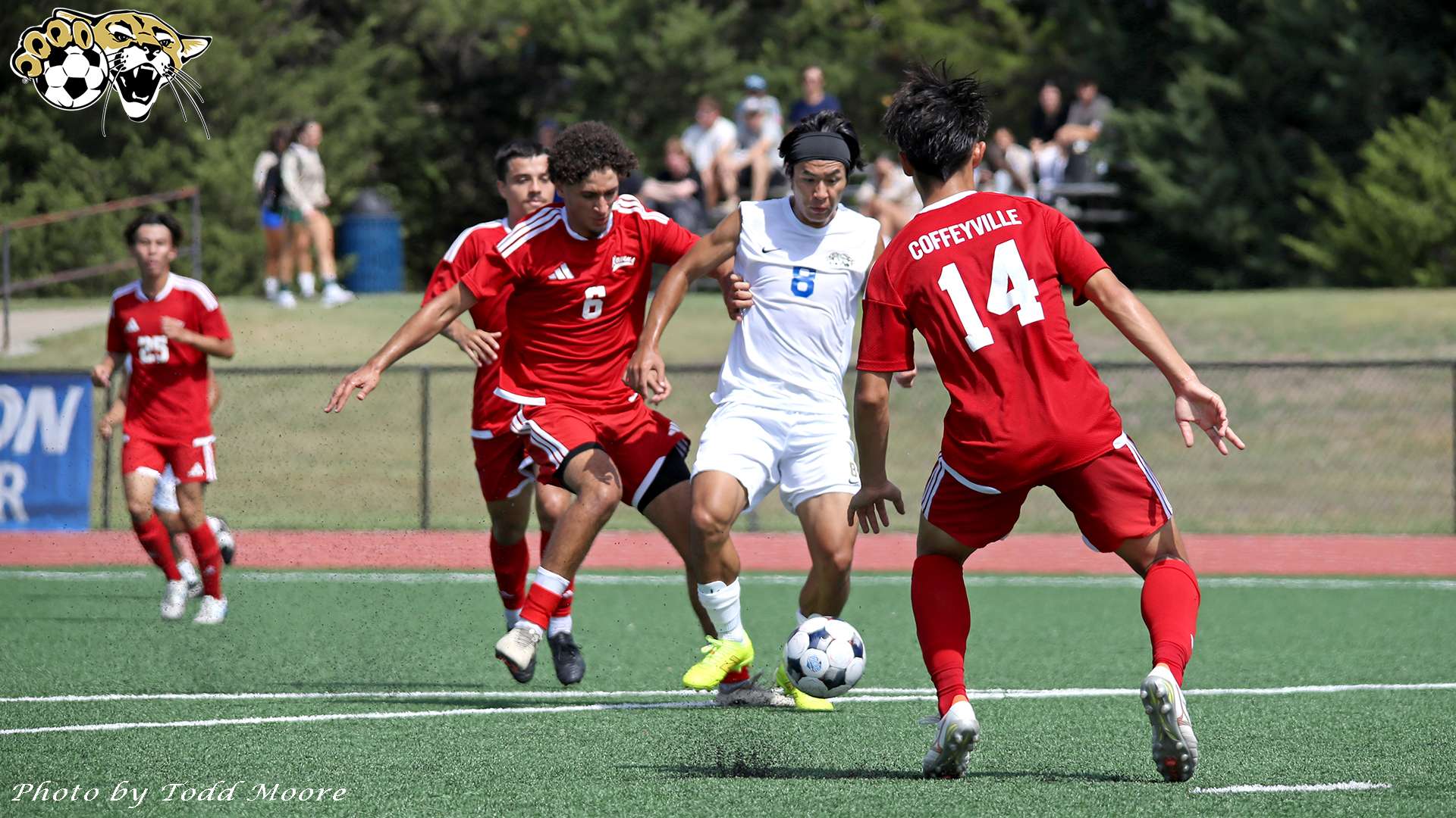 Yuto Saeki dribbling around defender (BartonSports.com)