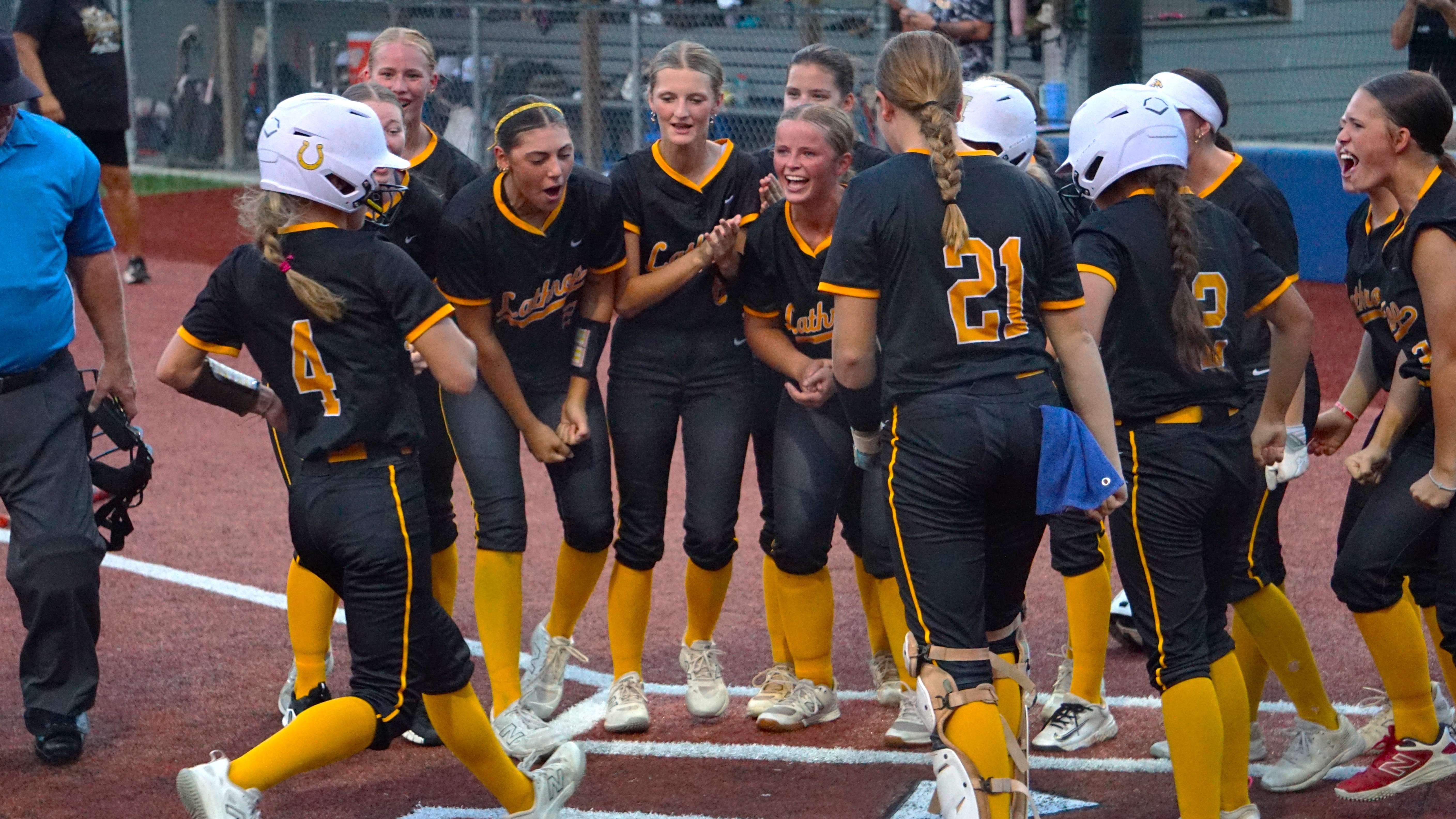Lathrop's Jade Hadley crosses home plate after hitting a home run/ Photo by Matt Pike