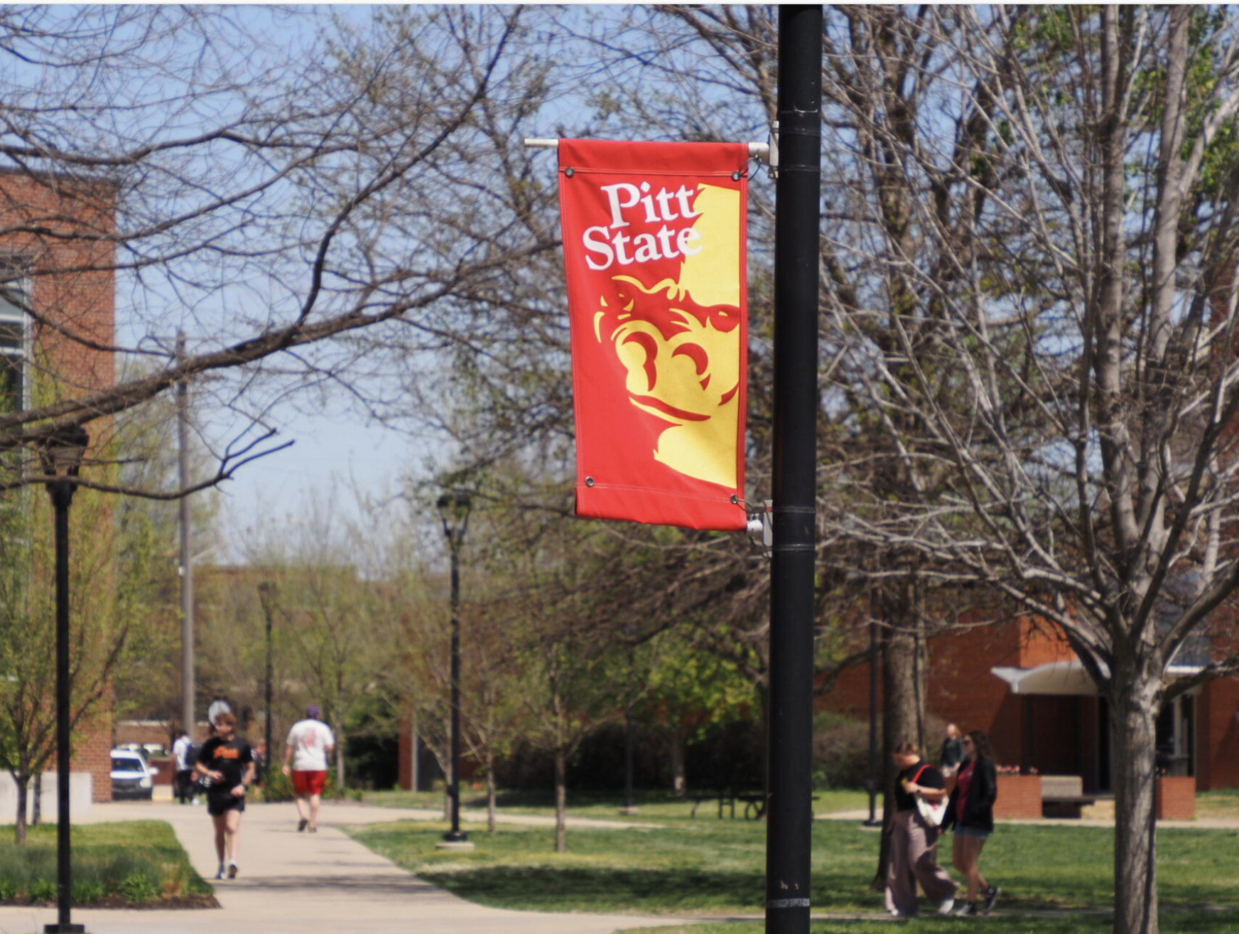  The Kansas Board of Regents is delving into a policy study of artificial intelligence at Pittsburg State University and the five other state universities in Kansas. The board also agreed to submit a budget plan to the 2027 Kansas Legislature that includes a request for $10 million to modernize PSU's science laboratories. This is an April 11, 2025, image of the PSU campus. (Photo by Anna Kaminski/Kansas Reflector)