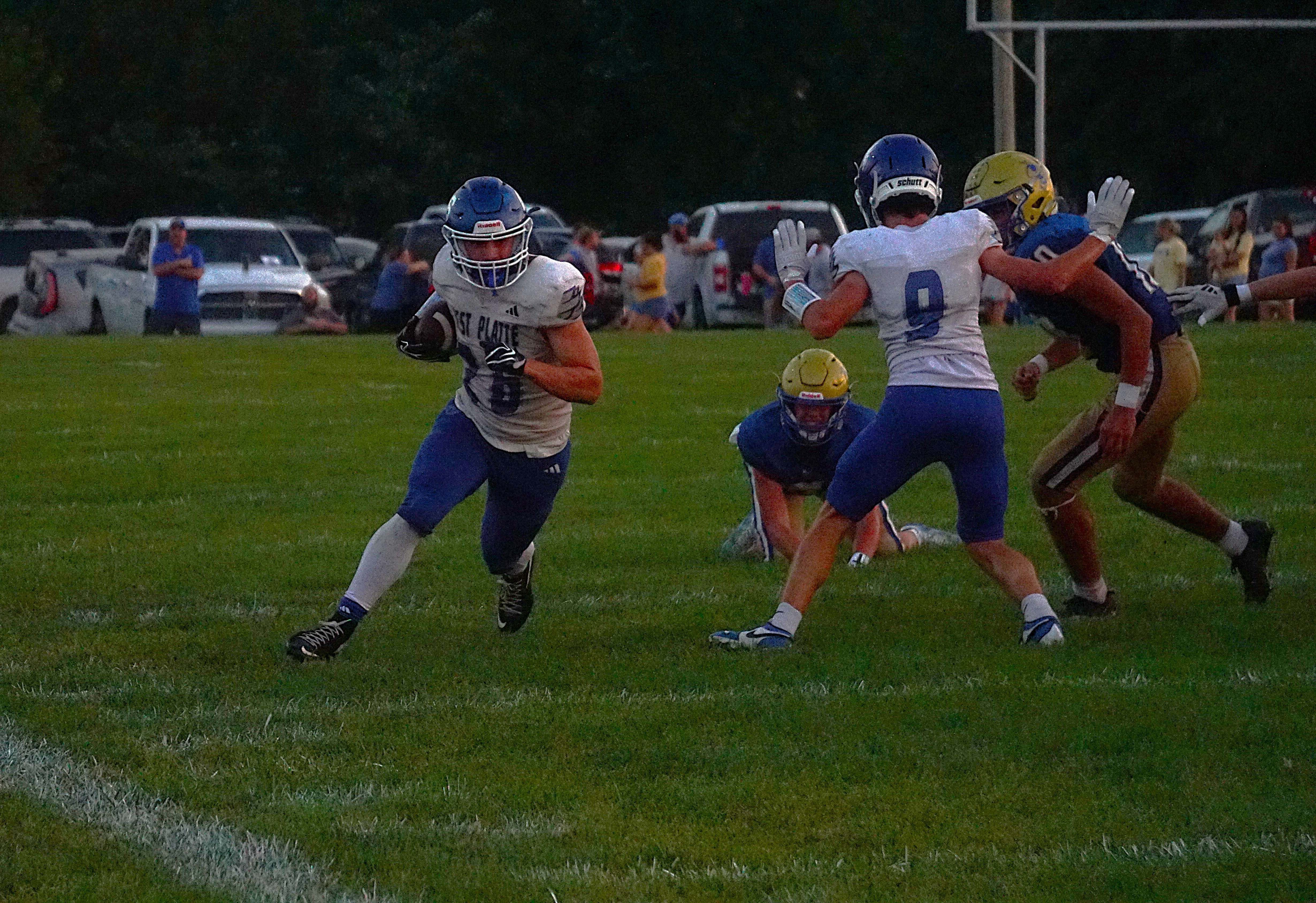West Platte's Brady McMillan (26) breaks a long run/ Photo by Matt Pike