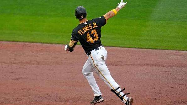 Pittsburgh Pirates' Rafael Flores Jr. rounds the bases after hitting a two-run home run off Kansas City Royals pitcher Nate Pearson during the eighth inning of a baseball game in Pittsburgh, Sunday, Sept. 20, 2026. (AP Photo/Gene J. Puskar)