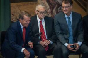 Nebraska Gov. Jim Pillen, left, with his former Husker football coach, Tom Osborne, before a ceremony honoring Osborne as the first living inductee of the Nebraska Hall of Fame in the Nebraska State Capitol Rotunda on Sept. 18, 2026. (Photo by Zach Wendling/Nebraska Examiner)