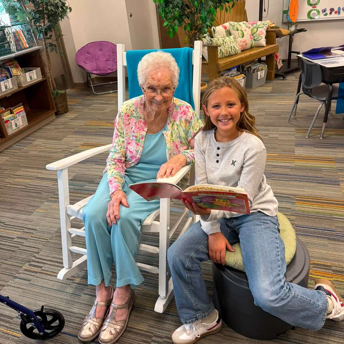 Students and residents at Logan LIFE Center frequently read books together.
