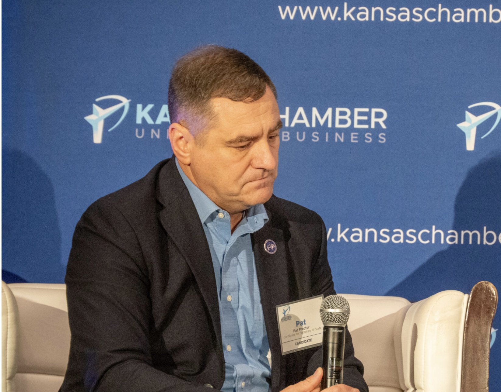  Rep. Pat Proctor, shown here at a candidate forum on Aug. 27, 2026, made a complaint to the attorney general about a League of Women Voters group in Leavenworth that gave high school students $5 Starbucks gift cards if they would register to vote. Although Proctor said he wants the group investigated, he asked that students who were "unwitting" participants not be investigated. (Photo by Anna Kaminski/Kansas Reflector)