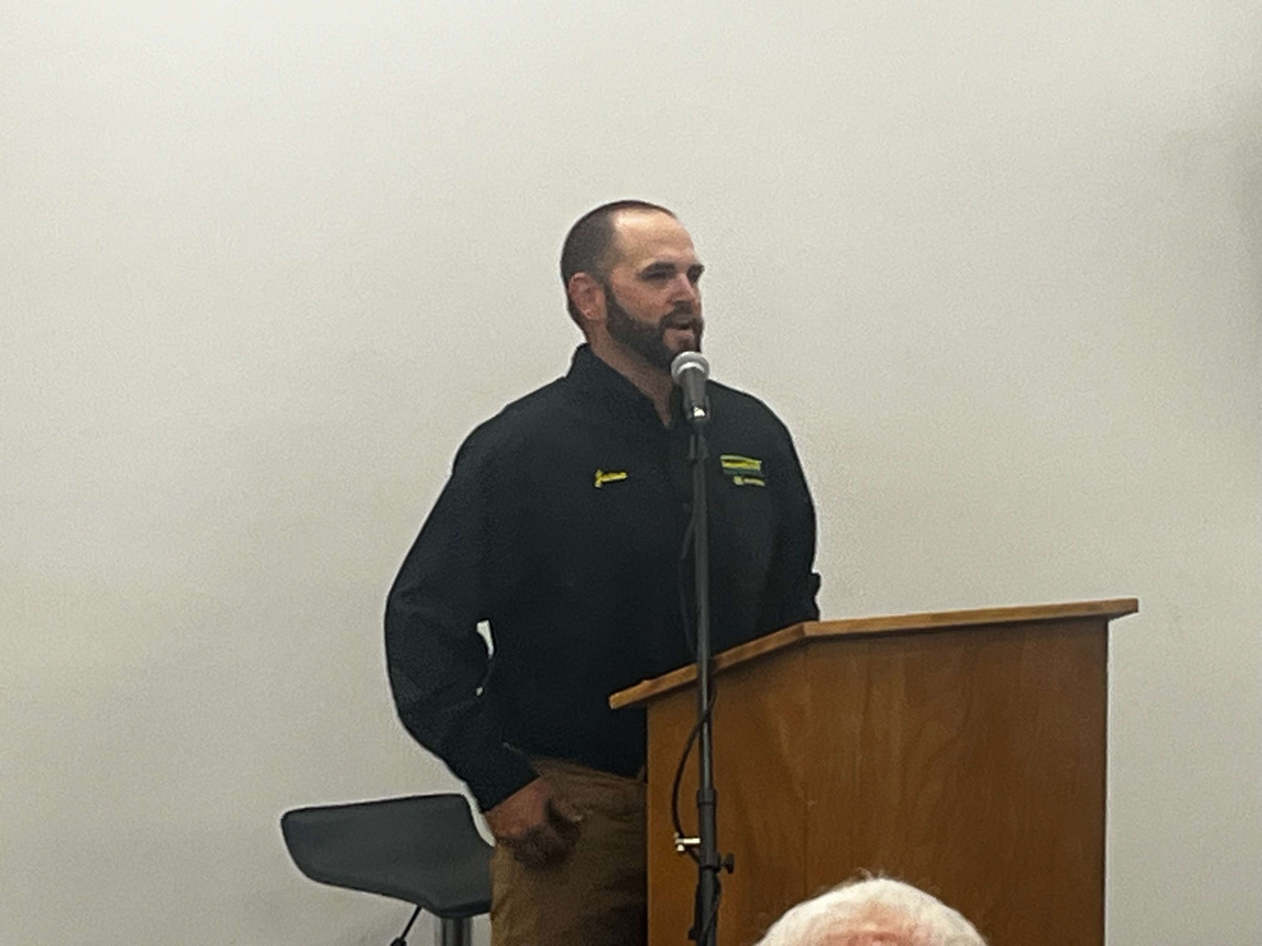 Jason Benge, manager of the PrairieLand Partners location in Hutchinson addresses the attendees during ceremonies on Sept. 25, 2026. (Hutch Post photo)