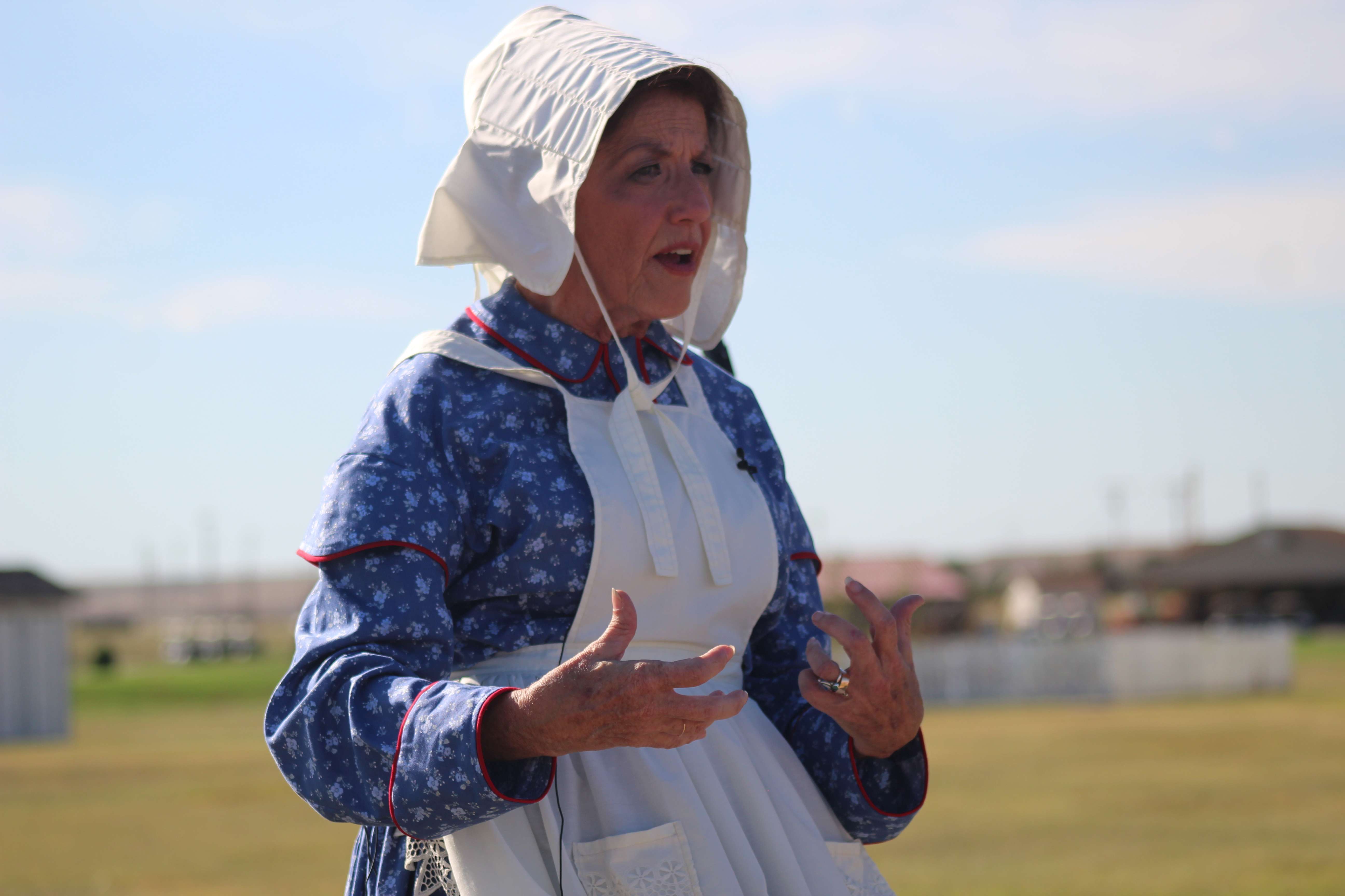 Marla Matkin of Friends of the Fort portrays Elizabeth Polly at the ceremony on Saturday.