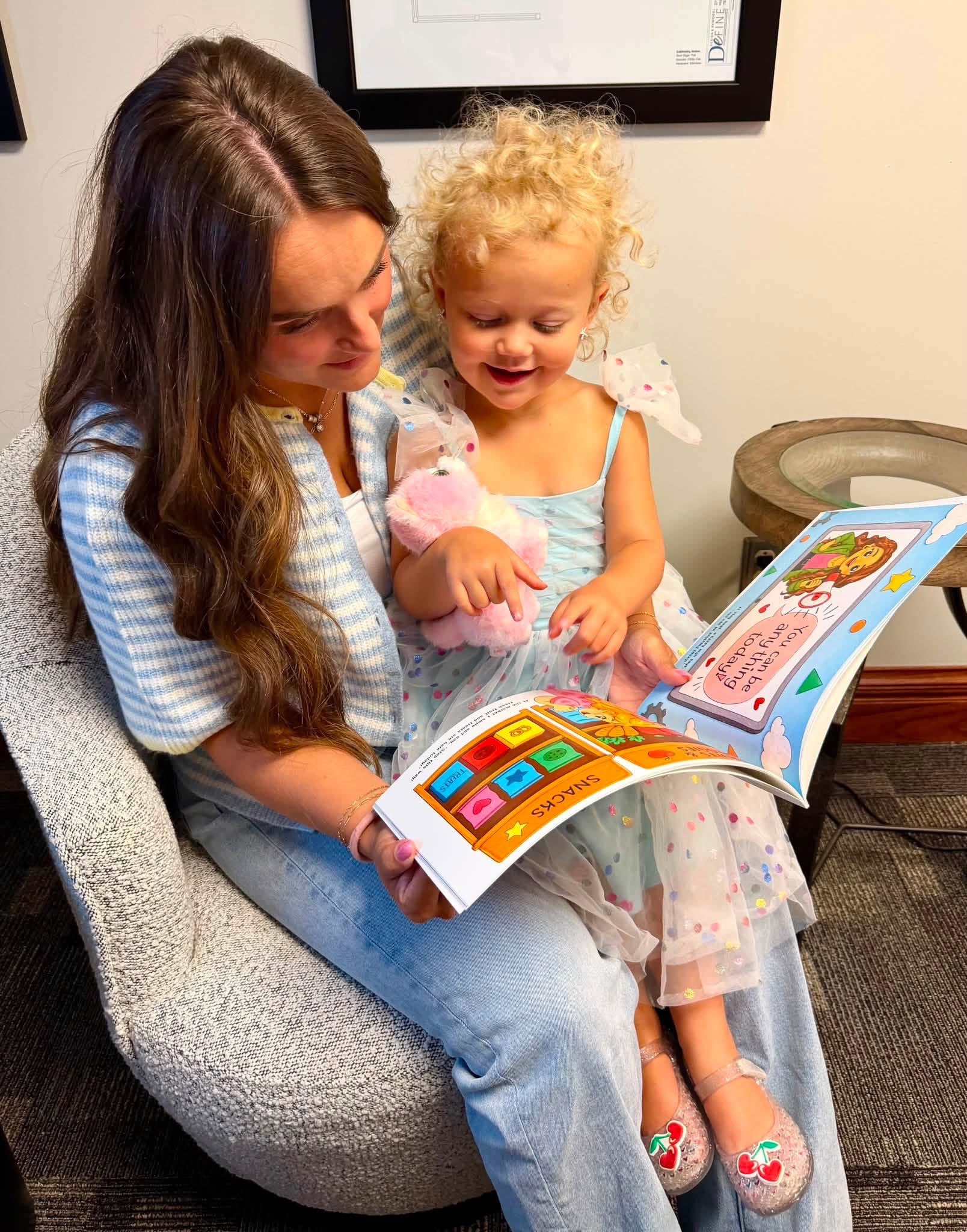 Mindy Werth reading the book to her daughter Kinley. Courtesy photo