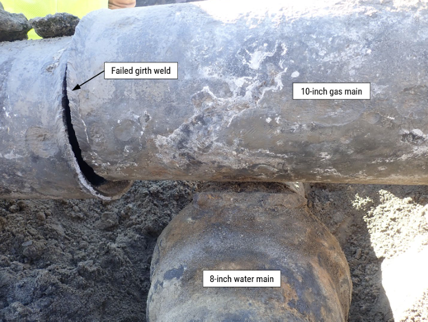 Ten-inch diameter gas main girth weld crossing over the 8-inch vintage water main. (Source: Baker Risk and NTSB)